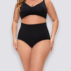 Celviroa black plus size high-waist shapewear shorts made of soft, breathable nylon with medium compression for tummy control and a smooth silhouette.